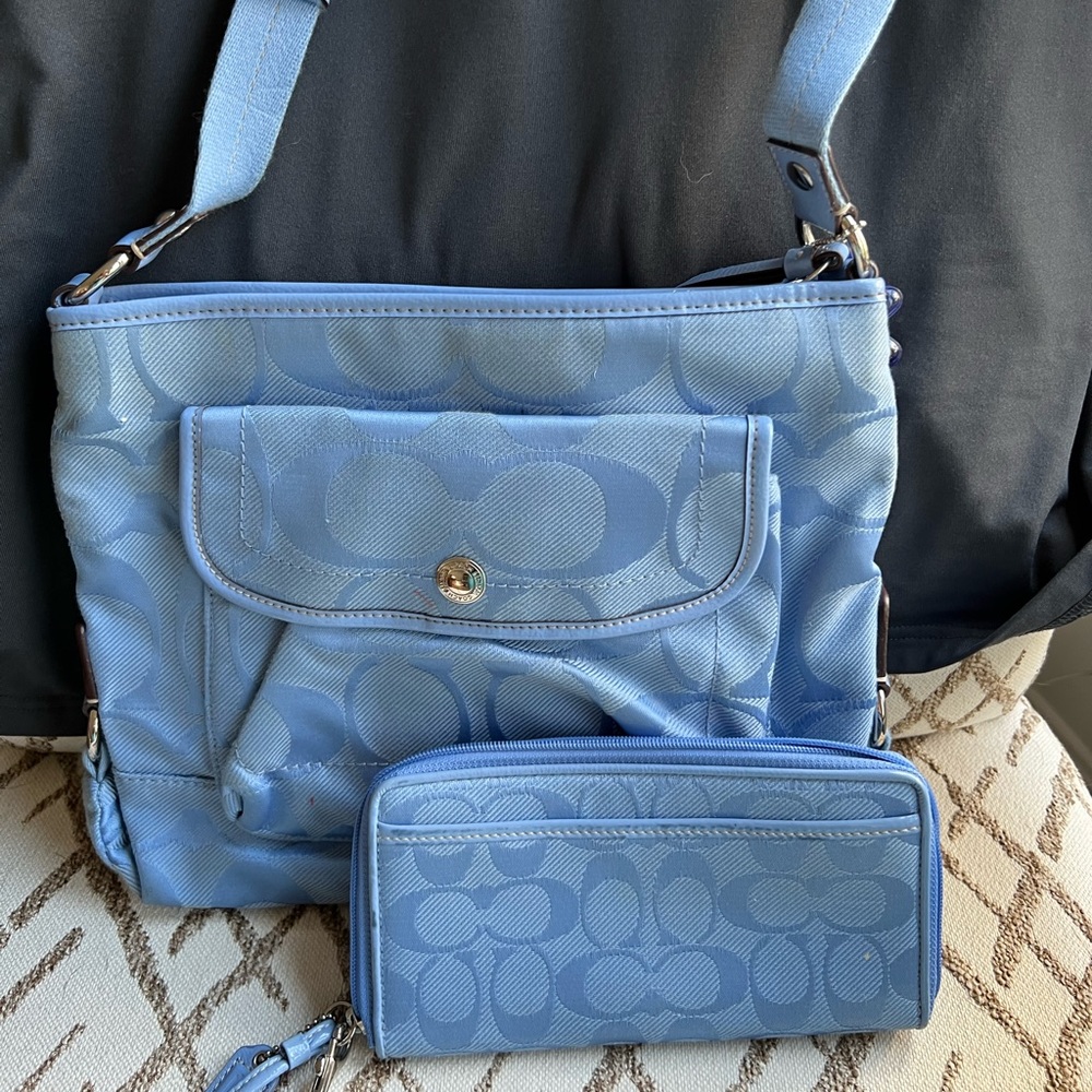 Coach crossbody bag and wallet. Some signs of use but still good condition.